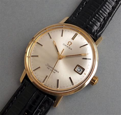 vintage 14k gold omega watches